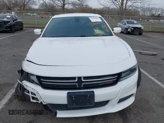 2015 Dodge Charger SE z VIN 2C3CDXBG6FH874656, wystawiony jako IAAI lot #41886805 z przebiegiem 121 568 mil mil oraz . Historia ofert i sprzedaży dostępna na DreamBid. Obrazek 12.