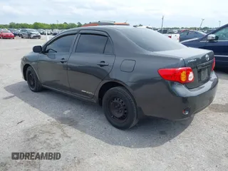 2010 Toyota Corolla with VIN 1NXBU4EE7AZ237289, listed as a IAAI auction lot 41877935 with 198,861 mi miles. Bid and sale history available at carsss.com. Image 3.