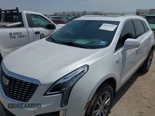 2021 Cadillac XT5 FWD Premium Luxury z VIN 1GYKNCR42MZ174309, wystawiony jako IAAI lot #42051341 z przebiegiem 75 544 mil mil oraz . Historia ofert i sprzedaży dostępna na DreamBid. Obrazek 6.