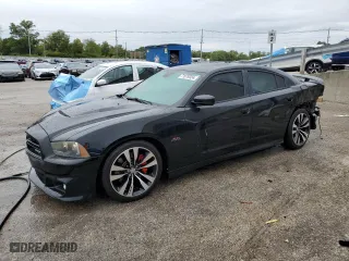 2012 Dodge Charger SRT8 with VIN 2C3CDXEJ8CH217246, listed as a Copart auction lot 71079334 with 105,528 mi miles and Salvage Title. Bid and sale history available at carsss.com. Image 1.