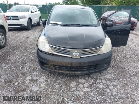 2009 Nissan Versa 1.8 S with VIN 3N1BC13E79L354341, listed as a IAAI auction lot 42079896 with 118,797 mi miles. Bid and sale history available at carsss.com. Image 6.
