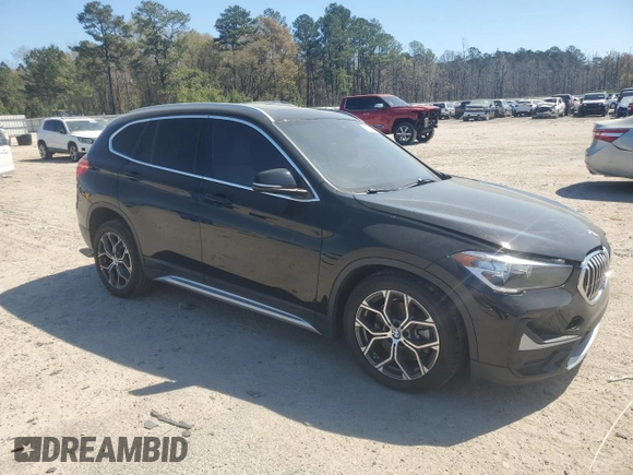 2021 BMW X1 xDrive28i z VIN WBXJG9C07M5S73464, wystawiony jako Copart lot #50374525 z przebiegiem 117 828 mil mil oraz Tytuł czysty. Historia ofert i sprzedaży dostępna na DreamBid. Obrazek 4.
