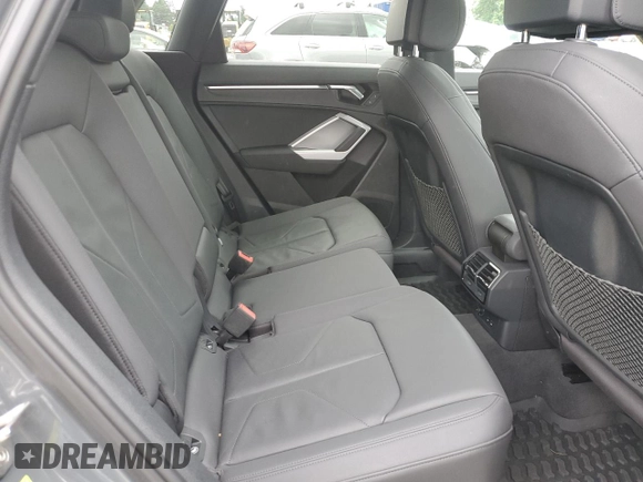 2020 Audi Q3 Premium with VIN WA1AECF31L1002342, listed as a Copart auction lot 60729665 with 29,154 mi miles and Salvage title. Bid and sale history available at DreamBid. Image 11.