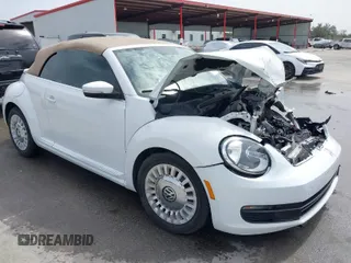 2015 Volkswagen Beetle 1.8T w/Tech with VIN 3VW517AT4FM812294, listed as a IAAI auction lot 41753967 with 59,857 mi miles and . Bid and sale history available at DreamBid. Image 1.