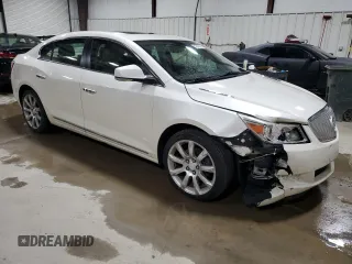 2012 Buick LaCrosse Touring with VIN 1G4GJ5E3XCF137276, listed as a Copart auction lot 51649255 with 102,265 mi miles and Salvage title. Bid and sale history available at DreamBid. Image 4.