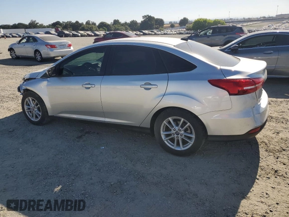 2018 Ford Focus SE with VIN 1FADP3FE4JL308909, listed as a Copart auction lot 61489005 with 58,613 mi miles and Salvage title. Bid and sale history available at DreamBid. Image 2.