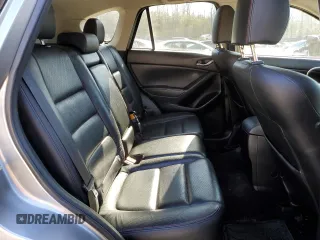 2015 Mazda CX-5 Grand Touring with VIN JM3KE4DY5F0460465, listed as a Copart auction lot 46392605 with 103,185 mi miles and Salvage Title. Bid and sale history available at carsss.com. Image 11.