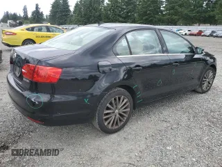 2011 Volkswagen Jetta SEL with VIN 3VWLZ7AJ1BM304504, listed as a Copart auction lot 60991215 with 189,148 mi miles and Salvage title. Bid and sale history available at DreamBid. Image 3.