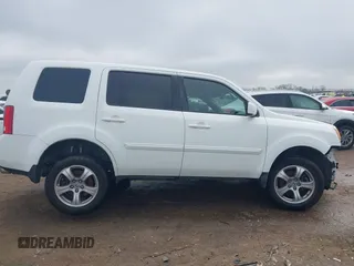 2012 Honda Pilot EX-L with VIN 5FNYF3H51CB012098, listed as a IAAI auction lot 41521214 with 157,701 mi miles. Bid and sale history available at carsss.com. Image 14.