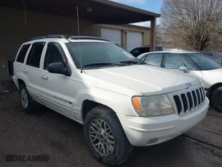 2003 Jeep Grand Cherokee Limited with VIN 1J4GW58N63C505919, listed as a IAAI auction lot 41566997 with 233,827 mi miles. Bid and sale history available at carsss.com. Image 1.