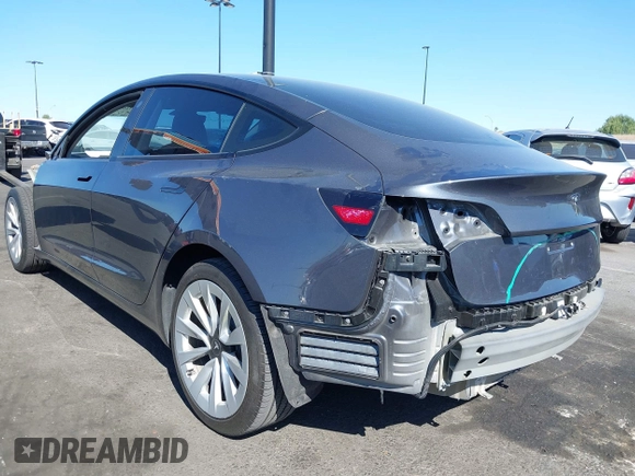 2023 Tesla Model 3 with VIN 5YJ3E1EA2PF640289, listed as a IAAI auction lot 42000200 with 14,194 mi miles and . Bid and sale history available at DreamBid. Image 3.