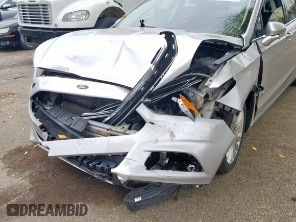 2016 Ford Fusion SE Hybrid with VIN 3FA6P0LUXGR397589, listed as a Copart auction lot 58180612 with 72,400 mi miles and Salvage Title. Bid and sale history available at carsss.com. Image 9.