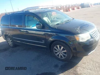 2009 Chrysler Town & Country Touring with VIN 2A8HR54X59R641735, listed as a IAAI auction lot 41328114 with 117,503 mi miles and . Bid and sale history available at DreamBid. Image 1.
