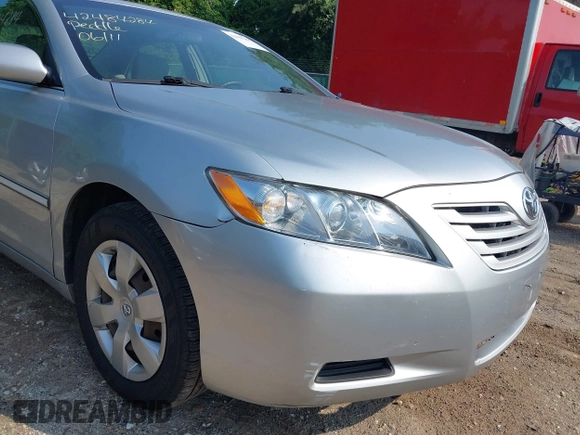 2007 Toyota Camry CE z VIN 4T1BE46K97U522294, wystawiony jako IAAI lot #42484284 z przebiegiem 150 683 mil mil oraz . Historia ofert i sprzedaży dostępna na DreamBid. Obrazek 14.