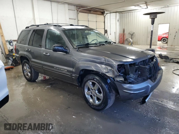 2004 Jeep Grand Cherokee Limited with VIN 1J8GX58N84C330702, listed as a Copart auction lot 84808454 with 164,426 mi miles and Salvage Title. Bid and sale history available at DreamBid. Image 4.