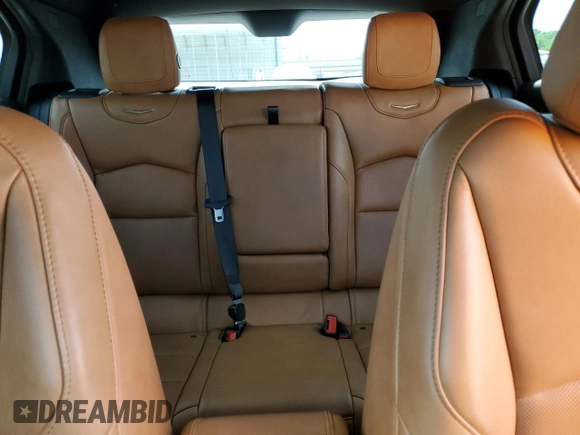 2020 Cadillac XT4 FWD Sport with VIN 1GYFZER48LF012489, listed as a Copart auction lot 54434025 with 74,249 mi miles and Salvage title. Bid and sale history available at DreamBid. Image 10.