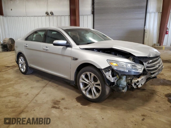 2013 Ford Taurus SEL z VIN 1FAHP2E82DG174647, wystawiony jako Copart lot #53784995 z przebiegiem Nie podano mil oraz Szkoda całkowita • Salvage title. Historia ofert i sprzedaży dostępna na DreamBid. Obrazek 4.