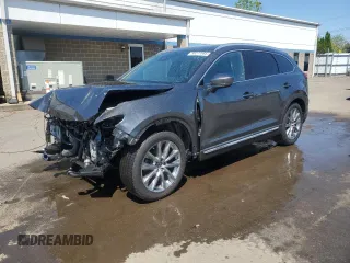 2019 Mazda CX-9 Grand Touring z VIN JM3TCBDY1K0310099, wystawiony jako Copart lot #56277685 z przebiegiem 49 219 mil mil oraz Szkoda całkowita • Salvage title. Historia ofert i sprzedaży dostępna na DreamBid. Obrazek 1.