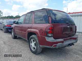 2005 Chevrolet TrailBlazer LS with VIN 1GNDS13S052269570, listed as a IAAI auction lot 42041784 with 143,024 mi miles and . Bid and sale history available at DreamBid. Image 3.