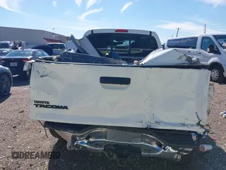 2013 Toyota Tacoma PreRunner with VIN 3TMKU4HN8DM038566, listed as a IAAI auction lot 41296386 with 153,240 mi miles and . Bid and sale history available at DreamBid. Image 17.