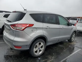 2013 Ford Escape SE with VIN 1FMCU9G98DUB40401, listed as a Copart auction lot 49440175 with 165,068 mi miles and Salvage Title. Bid and sale history available at carsss.com. Image 3.