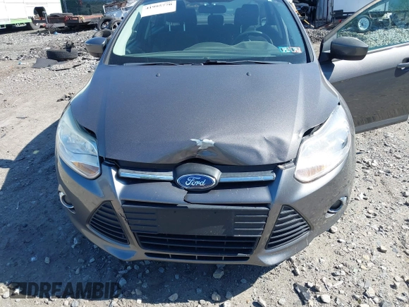 2012 Ford Focus SE with VIN 1FAHP3F27CL276208, listed as a IAAI auction lot 41995770 with 98,004 mi miles. Bid and sale history available at carsss.com. Image 6.
