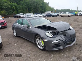 2016 Porsche Panamera S E-Hybrid with VIN WP0AD2A77GL040200, listed as a IAAI auction lot 42685775 with 113,659 mi miles and . Bid and sale history available at DreamBid. Image 1.