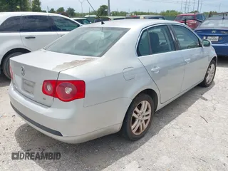2007 Volkswagen Jetta Wolfsburg Edition with VIN 3VWEF71K87M196027, listed as a IAAI auction lot 42804650 with 205,019 mi miles and . Bid and sale history available at DreamBid. Image 4.