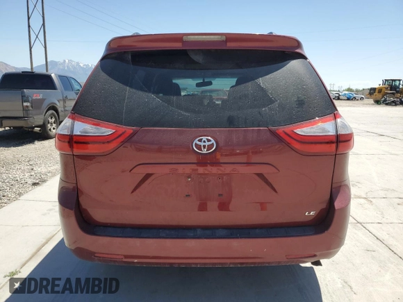 2015 Toyota Sienna LE AAS with VIN 5TDKK3DC2FS604910, listed as a Copart auction lot 59231605 with 118,974 mi miles and Salvage title. Bid and sale history available at DreamBid. Image 6.