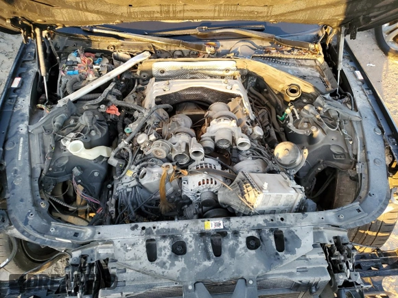 2017 BMW M6 z VIN WBS6J9C3XHD934858, wystawiony jako Copart lot #73714104 z przebiegiem Nie podano mil oraz Szkoda całkowita • Salvage title. Historia ofert i sprzedaży dostępna na DreamBid. Obrazek 11.