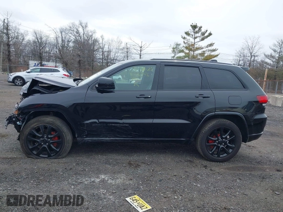 2018 Jeep Grand Cherokee Laredo with VIN 1C4RJFAG8JC356697, listed as a IAAI auction lot 41936524 with 78,292 mi miles and . Bid and sale history available at DreamBid. Image 14.