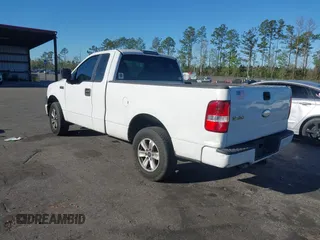 2007 Ford F-150 XL with VIN 1FTRF12237NA38894, listed as a IAAI auction lot 41834362 with 392,011 mi miles. Bid and sale history available at carsss.com. Image 3.