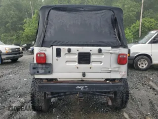 2004 Jeep Wrangler X with VIN 1J4FA39S84P718805, listed as a Copart auction lot 59949875 with 119,295 mi miles and Salvage title. Bid and sale history available at DreamBid. Image 6.