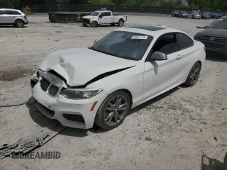 2015 BMW 2 Series M235i xDrive with VIN WBA1J9C59FVX99024, listed as a Copart auction lot 49821773 with 136,791 mi miles. Bid and sale history available at carsss.com. Image 1.