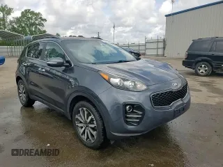 2019 Kia Sportage EX z VIN KNDPNCAC8K7585950, wystawiony jako Copart lot #53893385 z przebiegiem 52 903 mil mil oraz Szkoda całkowita • Salvage title. Historia ofert i sprzedaży dostępna na DreamBid. Obrazek 13.