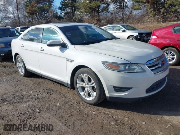 2014 Ford Taurus SEL with VIN 1FAHP2E88EG127074, listed as a IAAI auction lot 41688975 with 186,650 mi miles. Bid and sale history available at carsss.com. Image 1.
