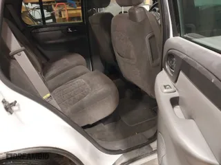 2004 GMC Envoy SLE with VIN 1GKDT13S042173138, listed as a IAAI auction lot 41340595 with 111,282 mi miles. Bid and sale history available at carsss.com. Image 8.