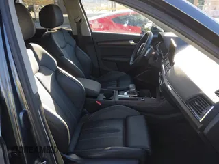 2023 Audi Q5 S line Premium Plus z VIN WA1EAAFY7P2065409, wystawiony jako IAAI lot #41305736 z przebiegiem 15 251 mil mil oraz . Historia ofert i sprzedaży dostępna na DreamBid. Obrazek 5.