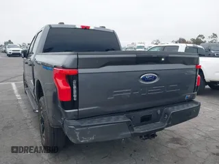 2023 Ford F-150 Lightning Pro with VIN 1FTVW1EL8PWG48559, listed as a IAAI auction lot 42033123 with 8,845 mi miles and . Bid and sale history available at DreamBid. Image 3.