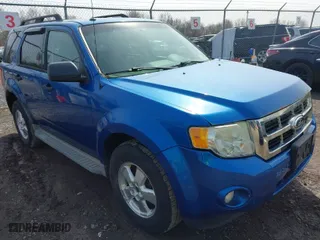 2011 Ford Escape XLT with VIN 1FMCU9DG6BKA30958, listed as a IAAI auction lot 42039665 with 165,716 mi miles. Bid and sale history available at carsss.com. Image 1.