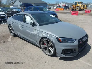 2019 Audi RS 5 Sportback z VIN WUABWCF53KA907286, wystawiony jako IAAI lot #42098943 z przebiegiem 62 275 mil mil oraz . Historia ofert i sprzedaży dostępna na DreamBid. Obrazek 1.