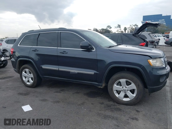 2013 Jeep Grand Cherokee Laredo with VIN 1C4RJEAGXDC620968, listed as a IAAI auction lot 41425270 with 127,739 mi miles. Bid and sale history available at carsss.com. Image 13.