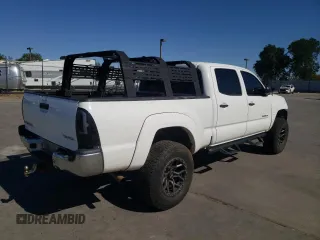 2013 Toyota Tacoma z VIN 3TMMU4FNXDM050603, wystawiony jako Copart lot #57648055 z przebiegiem 224 773 mil mil oraz Czysty tytuł • Clean title. Historia ofert i sprzedaży dostępna na DreamBid. Obrazek 3.