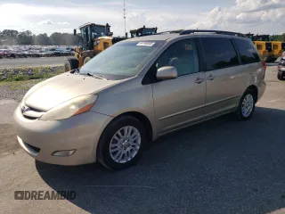 2010 Toyota Sienna XLE with VIN 5TDYK4CC1AS302504, listed as a Copart auction lot 64198005 with 203,197 mi miles and Clean title. Bid and sale history available at DreamBid. Image 1.