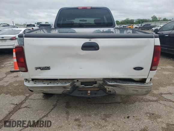 2002 Ford F-150 XL with VIN 1FTRX17L52KC49698, listed as a Copart auction lot 54307145 with 254,394 mi miles and Salvage title. Bid and sale history available at DreamBid. Image 6.