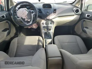 2014 Ford Fiesta SE with VIN 3FADP4BJ6EM151199, listed as a Copart auction lot 43125995 with 104,512 mi miles and Salvage Title. Bid and sale history available at DreamBid. Image 8.