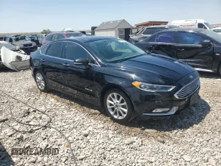 2017 Ford Fusion Hybrid SE with VIN 3FA6P0LU1HR266939, listed as a Copart auction lot 61018305 with 121,293 mi miles and Salvage title. Bid and sale history available at DreamBid. Image 4.