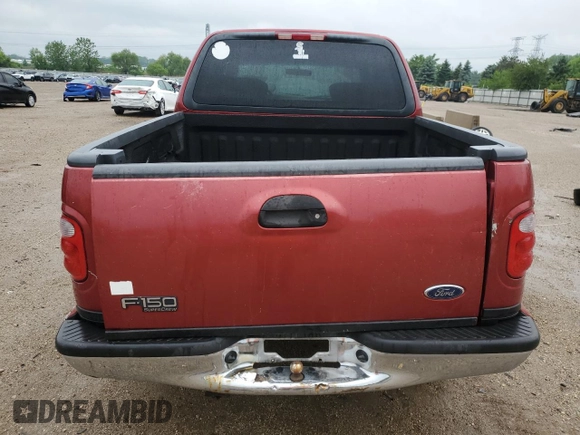 2001 Ford F-150 XLT with VIN 1FTRW08L41KB01407, listed as a Copart auction lot 59446555 with 285,312 mi miles and Salvage title. Bid and sale history available at DreamBid. Image 6.
