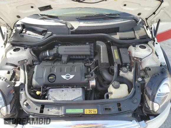 2007 MINI Hardtop with VIN WMWMF33547TT51590, listed as a Copart auction lot 57323995 with 114,113 mi miles and Salvage title. Bid and sale history available at DreamBid. Image 11.