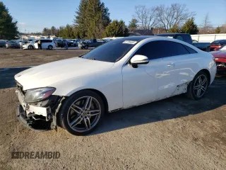 2018 Mercedes-Benz E-Class E 400 with VIN WDD1J6GB0JF009586, listed as a Copart auction lot 87794405 with 66,647 mi miles and Salvage Title. Bid and sale history available at carsss.com. Image 1.